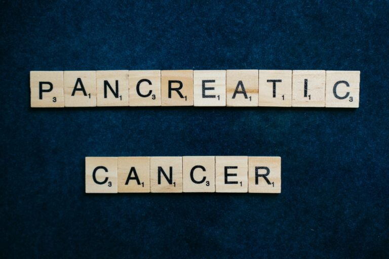 Text Made of Wooden Tiles with Letters Saying "Pancreatic Cancer