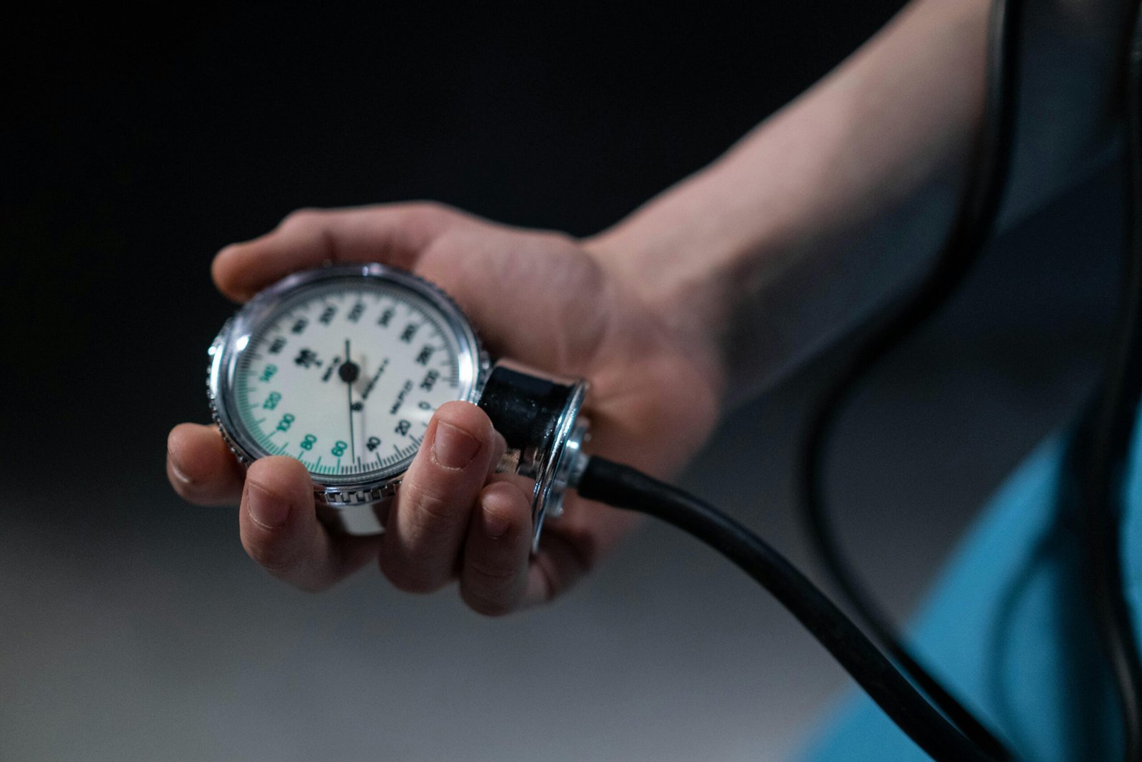 Close-up of Person Holding a Sphygmomanometer