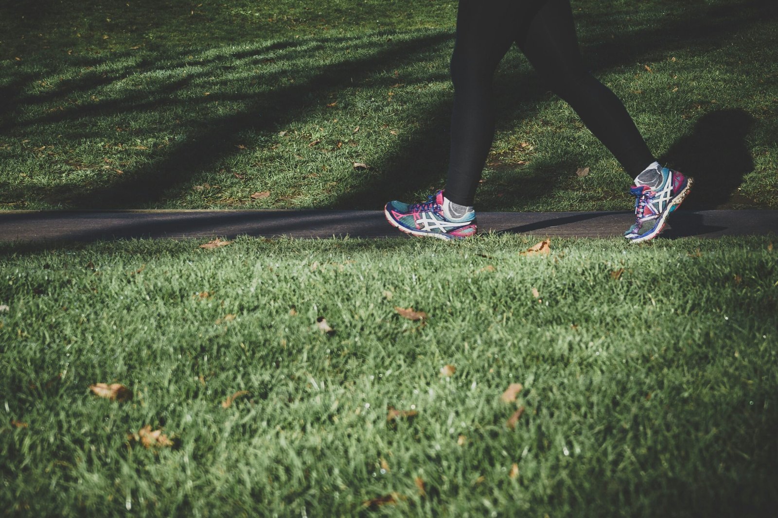 Lady walking in the park.