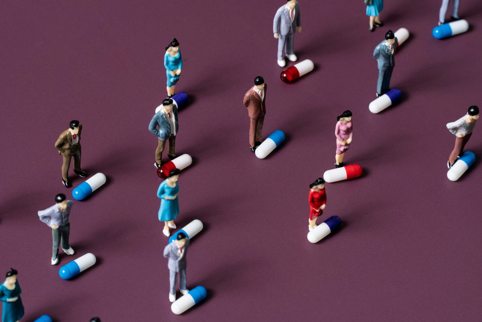 Miniature figures with pills.