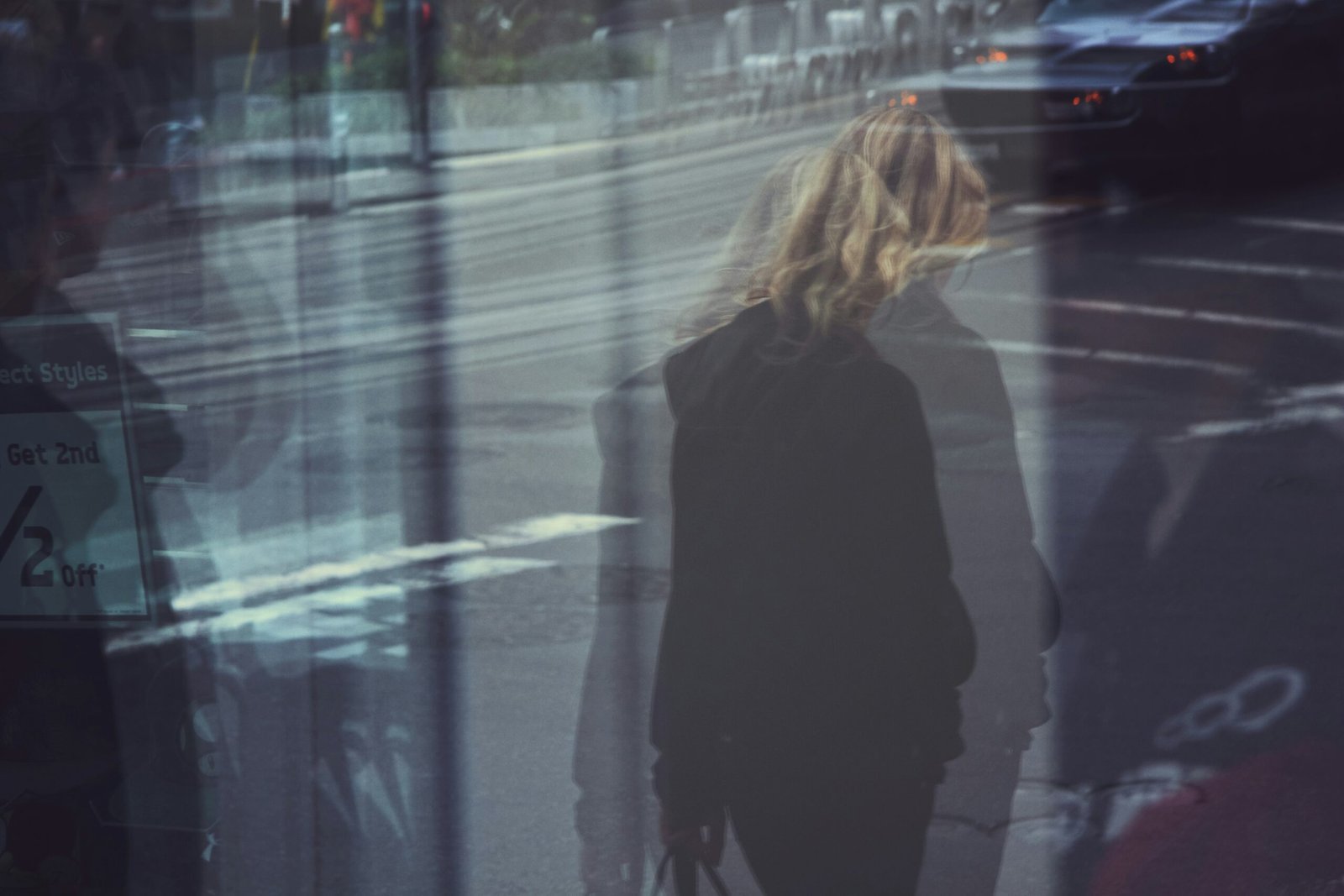 Blur picture of women walk on road.