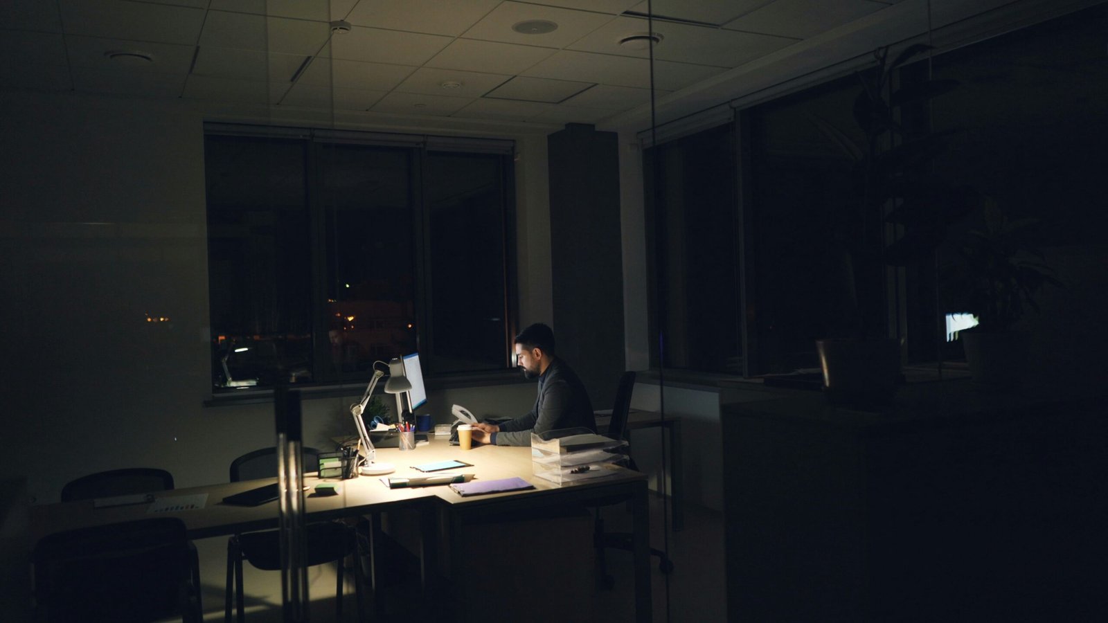 An office worker at night shift in the office.